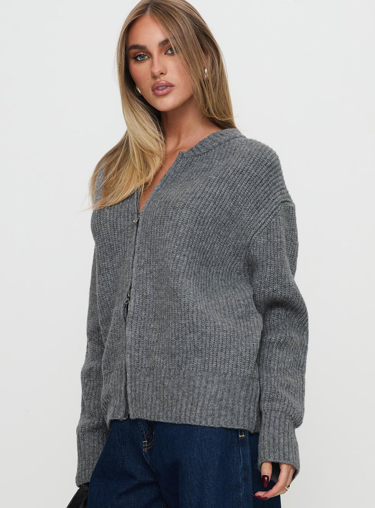 side view of model wearing Princess Polly Lexene Zip Through Jumper Grey Long 