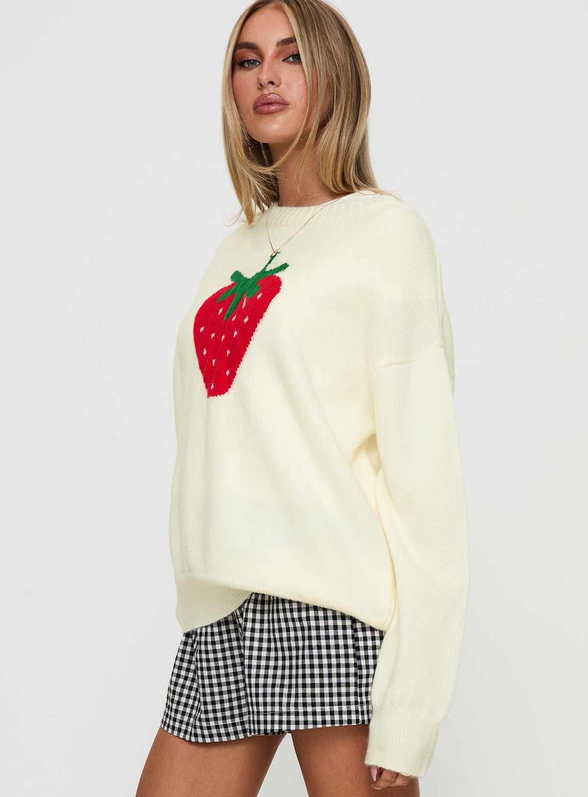 side view of model wearing Princess Polly Living Is Easy Knit Sweater White Long 