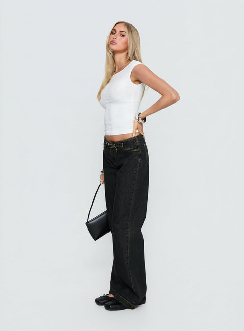 side view of model wearing Princess Polly Slow Ride Mid Rise Bootleg Belted Jeans Grunge Wash Mid Rise Jeans 