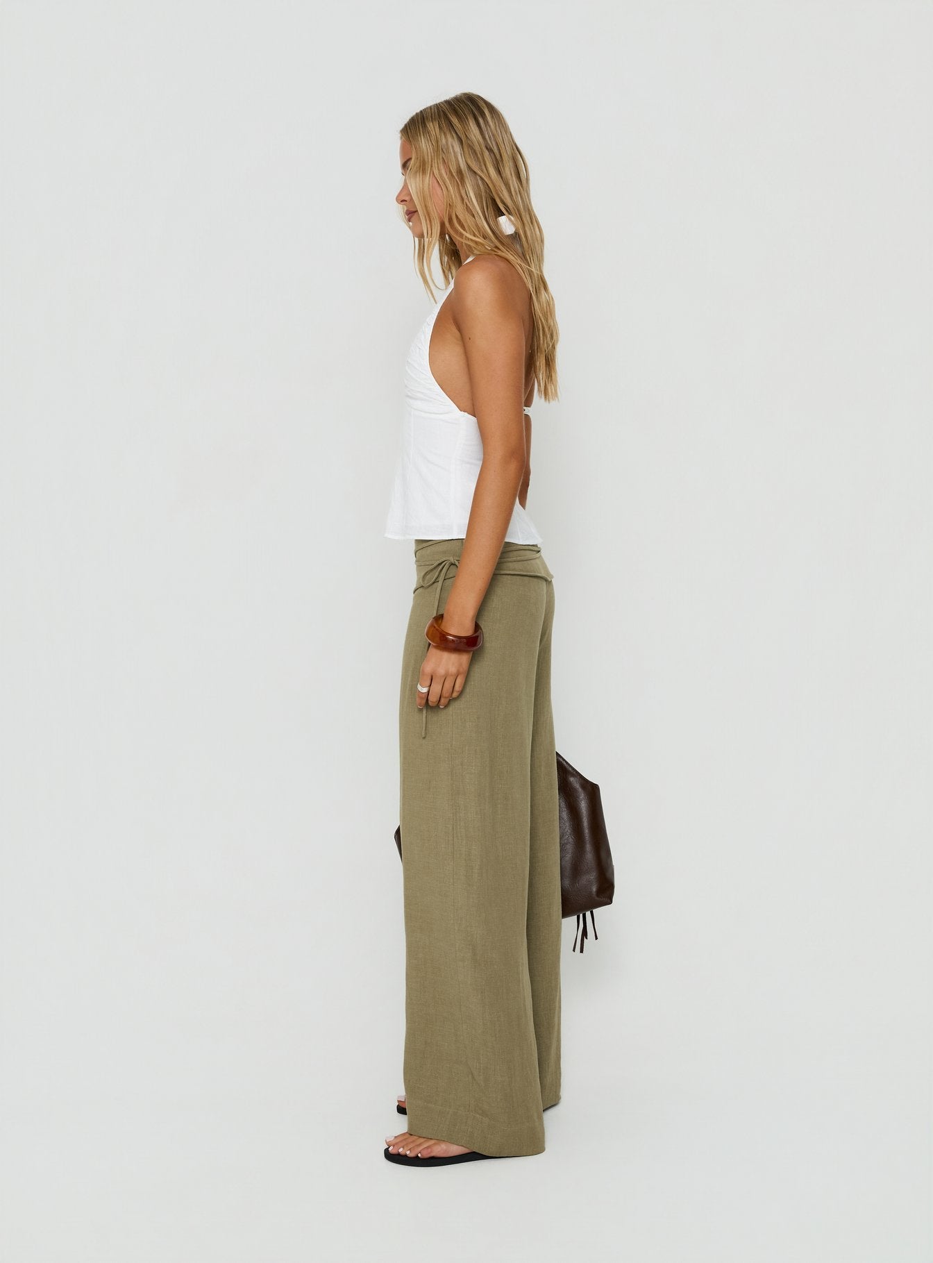 Crafted from linen blend, the Silver Moon Tie Pants in Olive Green womens-regular-pants with high-rise side view of model wearing Princess Polly