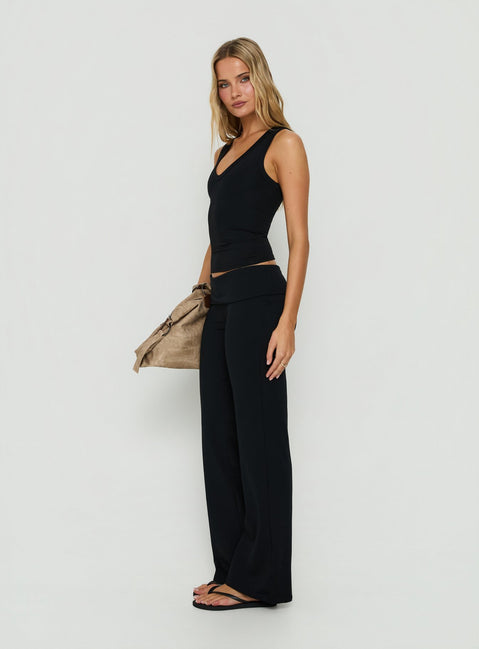 Displaying Daily Define Foldover Waist Pants Black womens-regular-pants in high-rise side view of model wearing