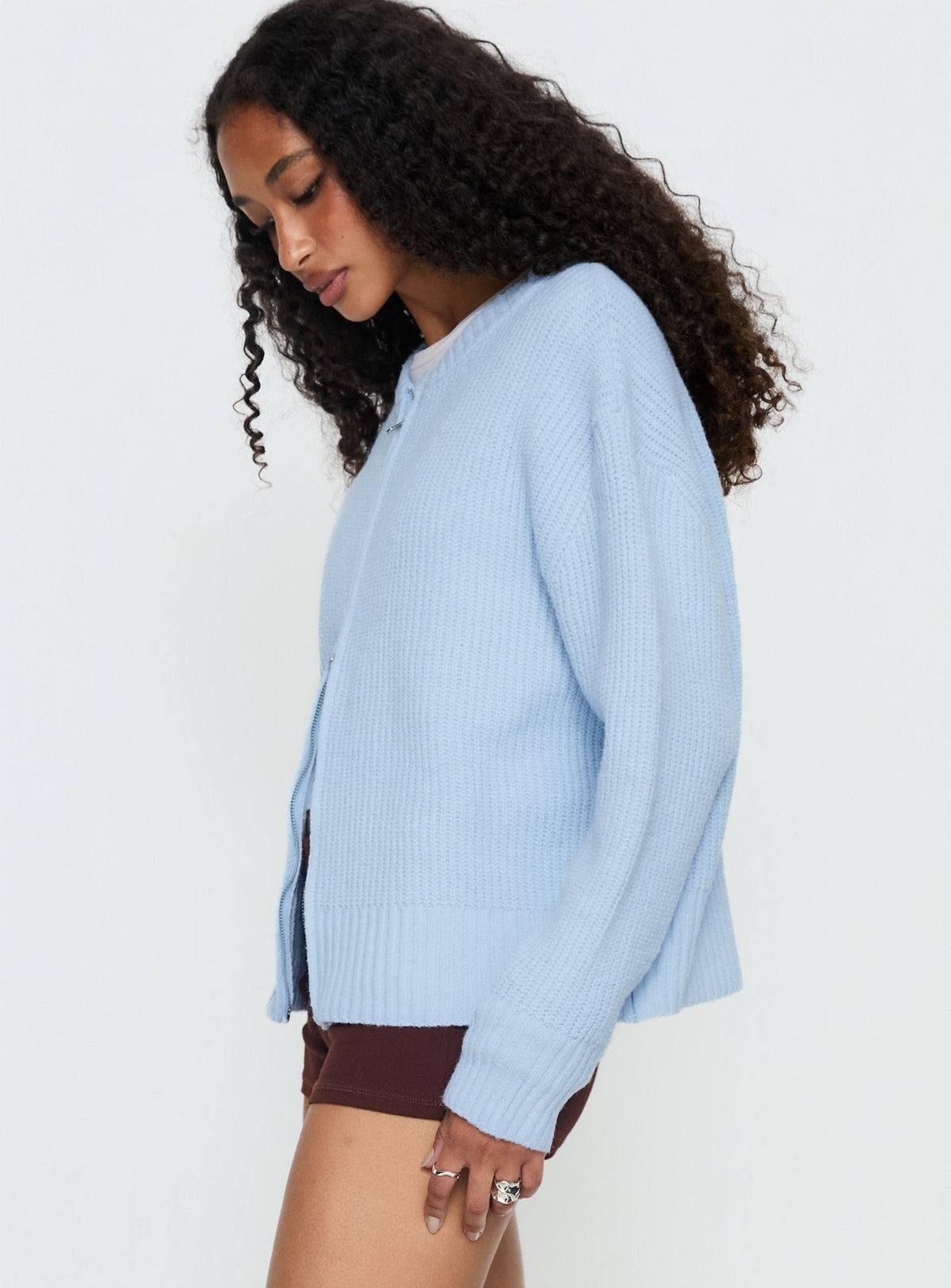 side view of model wearing Princess Polly Lexene Zip Through Jumper Baby Blue Longline Jumpers 