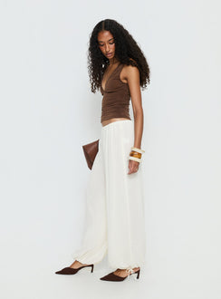 side view of model wearing Princess Polly Moondancer Balloon Pants Cream Mid Rise Pants 