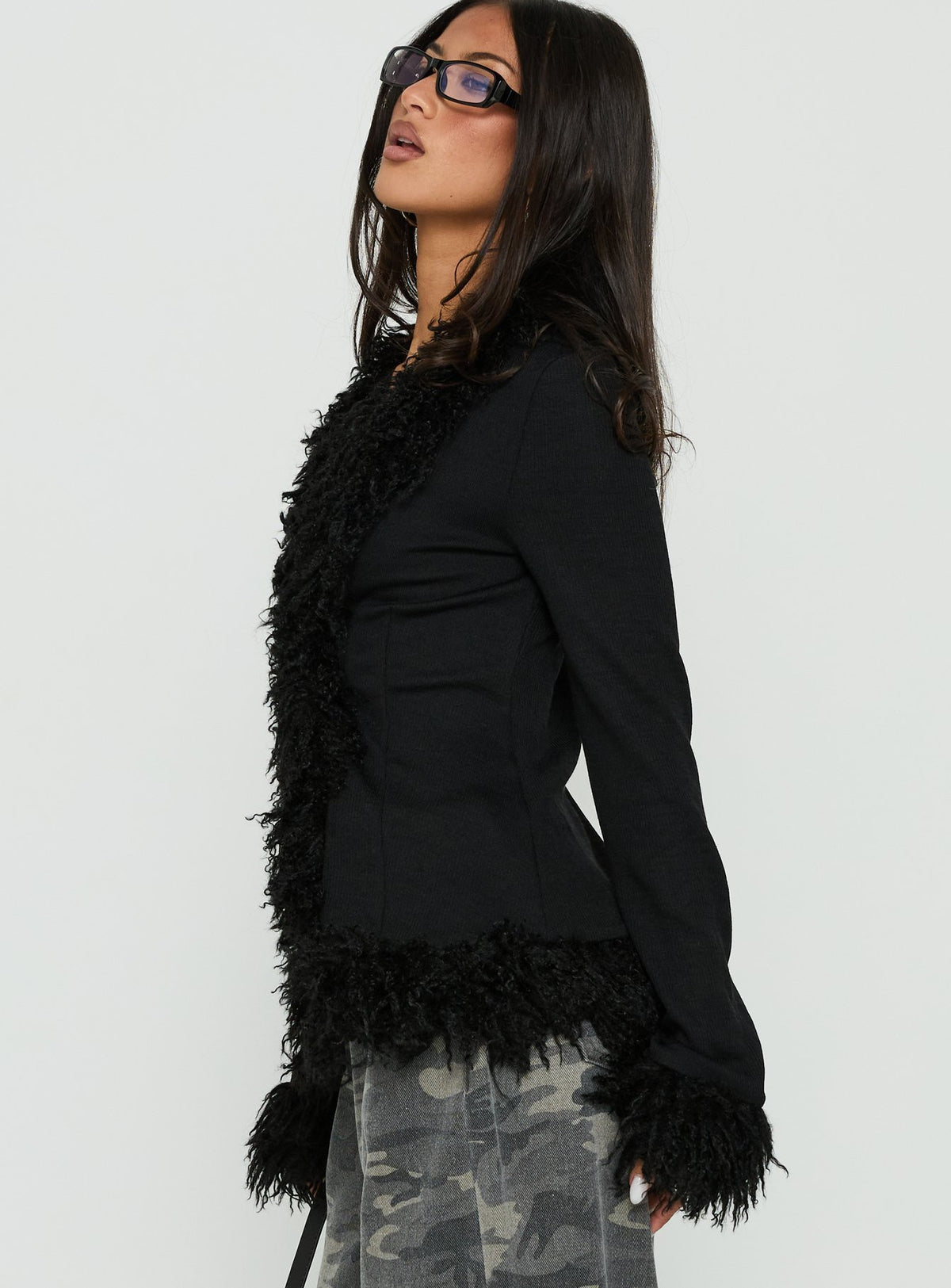Crafted with a Brynlie Faux Fur Trim Boxy Cardigan in Black womens-jumpers featuring short length side view of model wearing Princess Polly