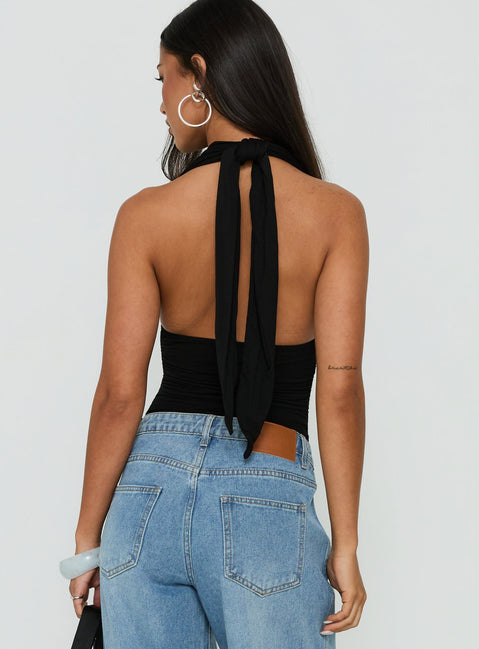 Crafted with style the Celinna Multi Wear Bodysuit in sleeveless black with plunge halter neckline and ruched details back view of model wearing