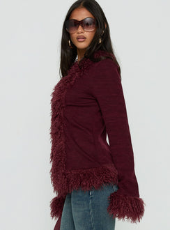 Featuring the Brynlie Faux Fur Trim Boxy Cardigan Burgundy womens jumper with short length side view of model wearing Princess Polly