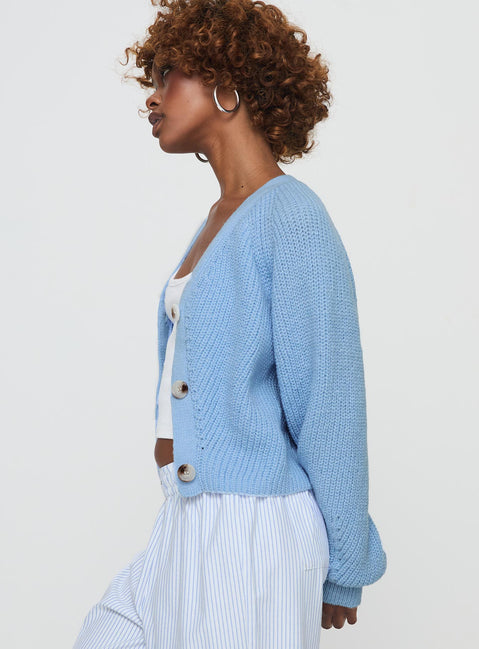 side view of model wearing Princess Polly Leskie Cardigan Pale Blue Cropped 
