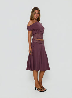 Designed with an aline shape, the Marienna Lace Midi Skirt Plum in womens-skirts side view of model wearing Princess Polly