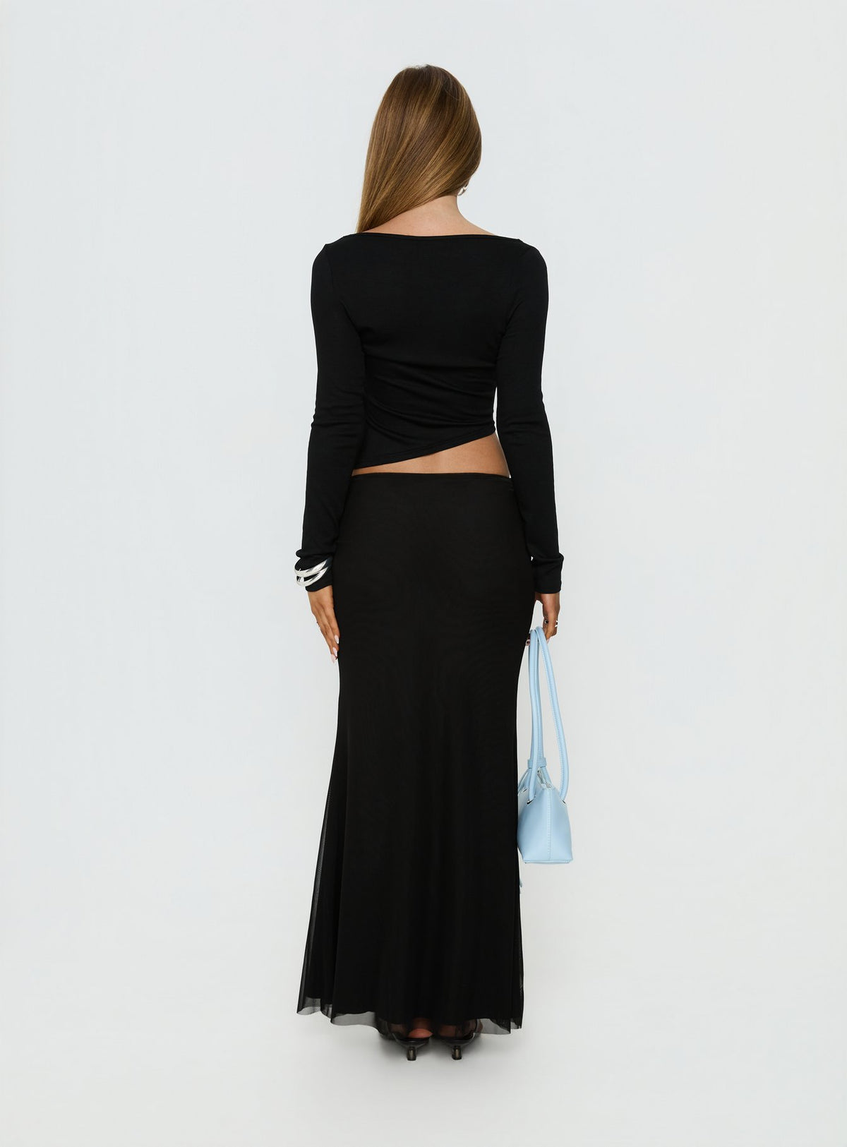 back view of model wearing Princess Polly Caviar Tie Maxi Skirt Black Maxi Skirts Skirts 