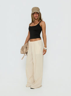 side view of model wearing Princess Polly Lunea Concealed Waistband Pants Beige Stripe Low Rise Pants Pants 