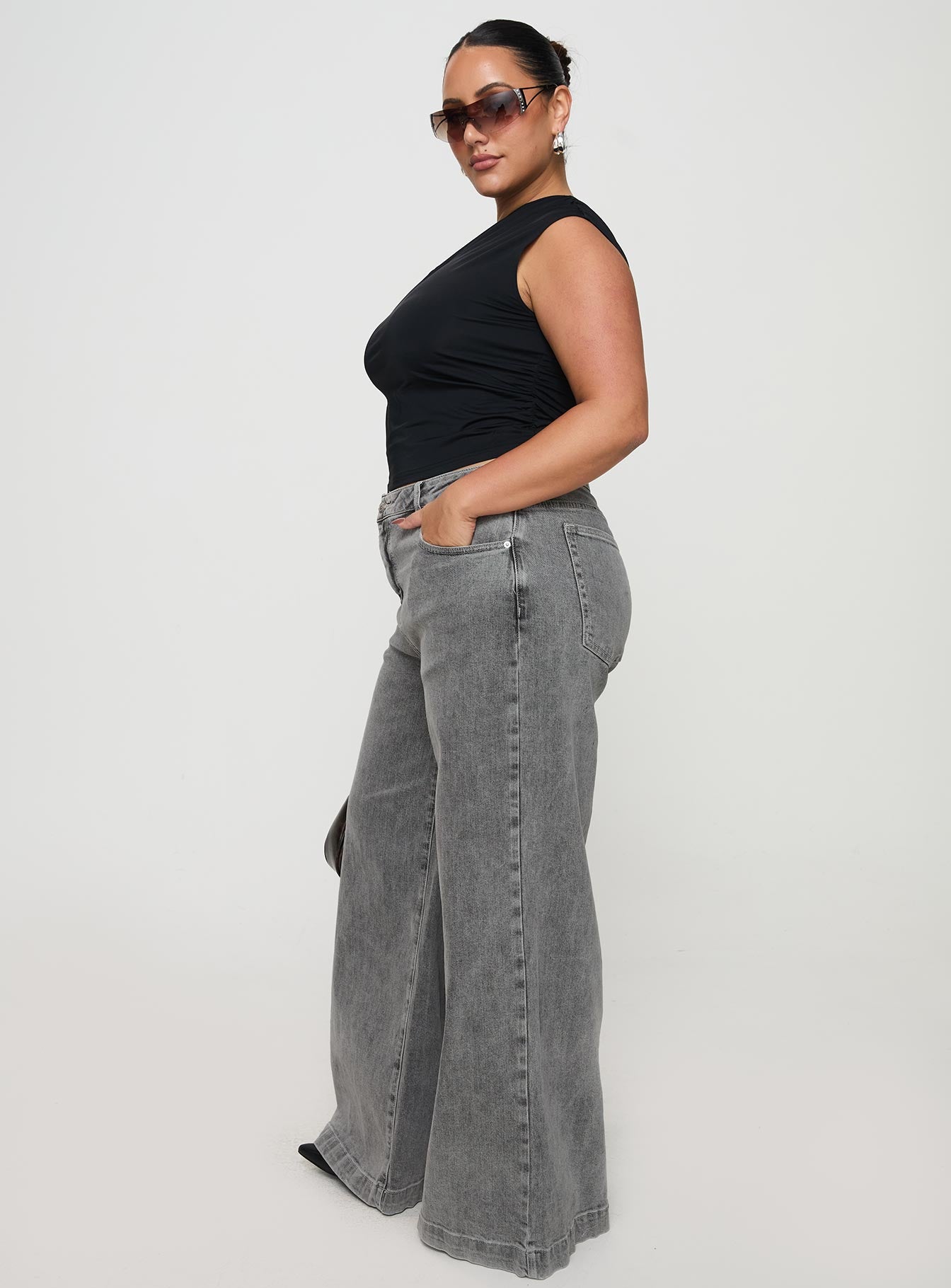 side view of model wearing Princess Polly Wolfie High Rise Wide Leg Slouchy Jeans Steel Curve High Rise Jeans Jeans 