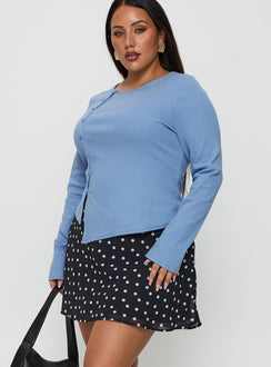   side view of model wearing Princess Polly Dapple Bias Mini Skirt Black Polka Dot Curve Mini Skirts 