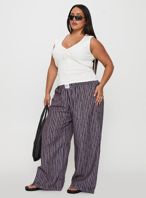 side view of model wearing Princess Polly Beach House Pants Multi Curve High Waisted Pants 