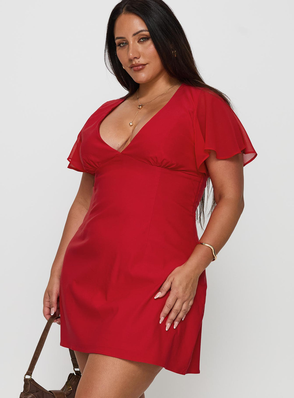 side view of model wearing Princess Polly Florie Corset Mini Dress Red Curve Plunger 