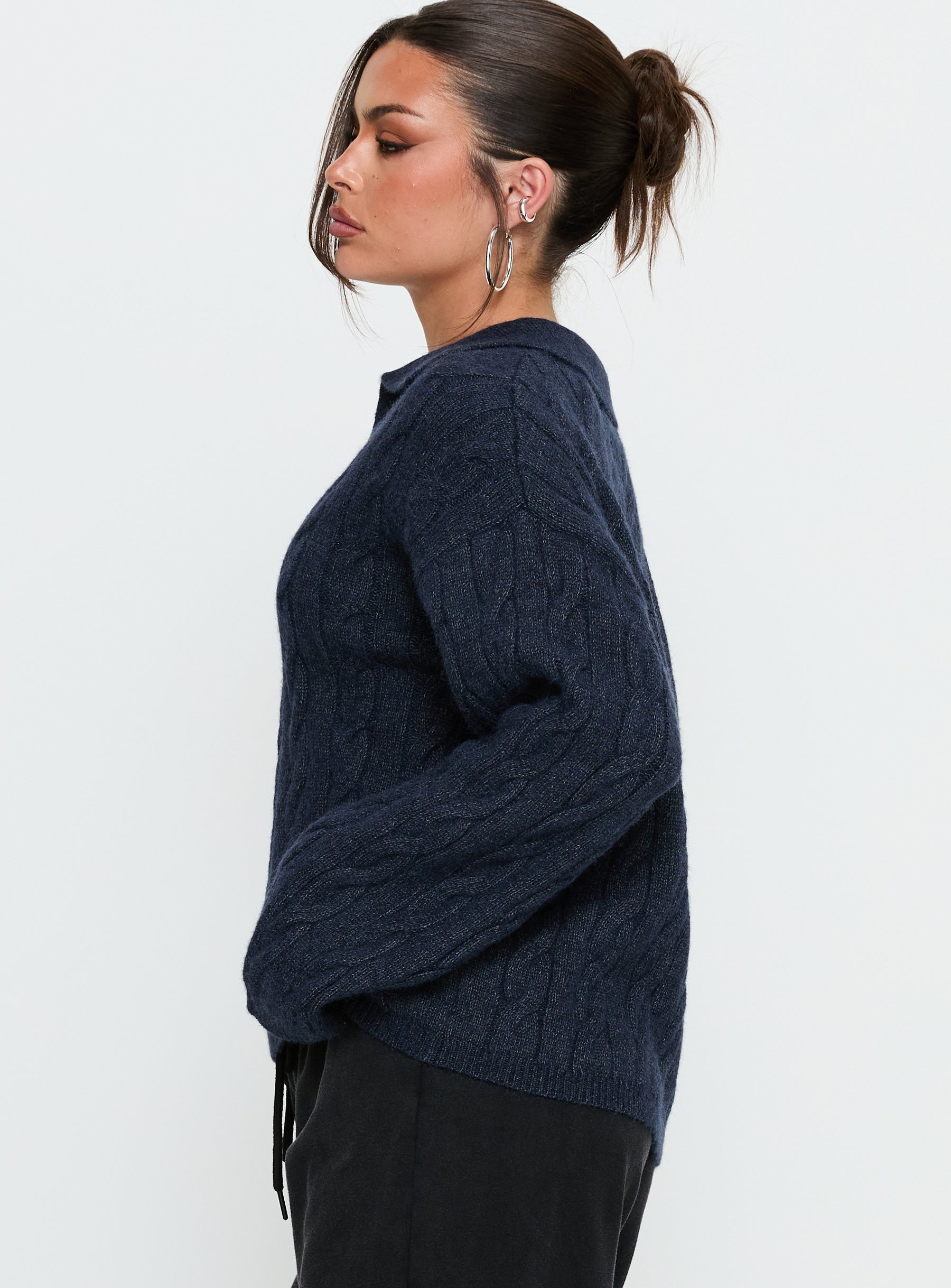 side view of model wearing Princess Polly Brodey Collared Cable Knit Sweater Navy 