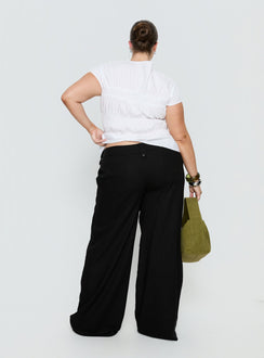 back view of model wearing Princess Polly Pedra Wide Leg Pant Black Curve Mid Rise Pants 