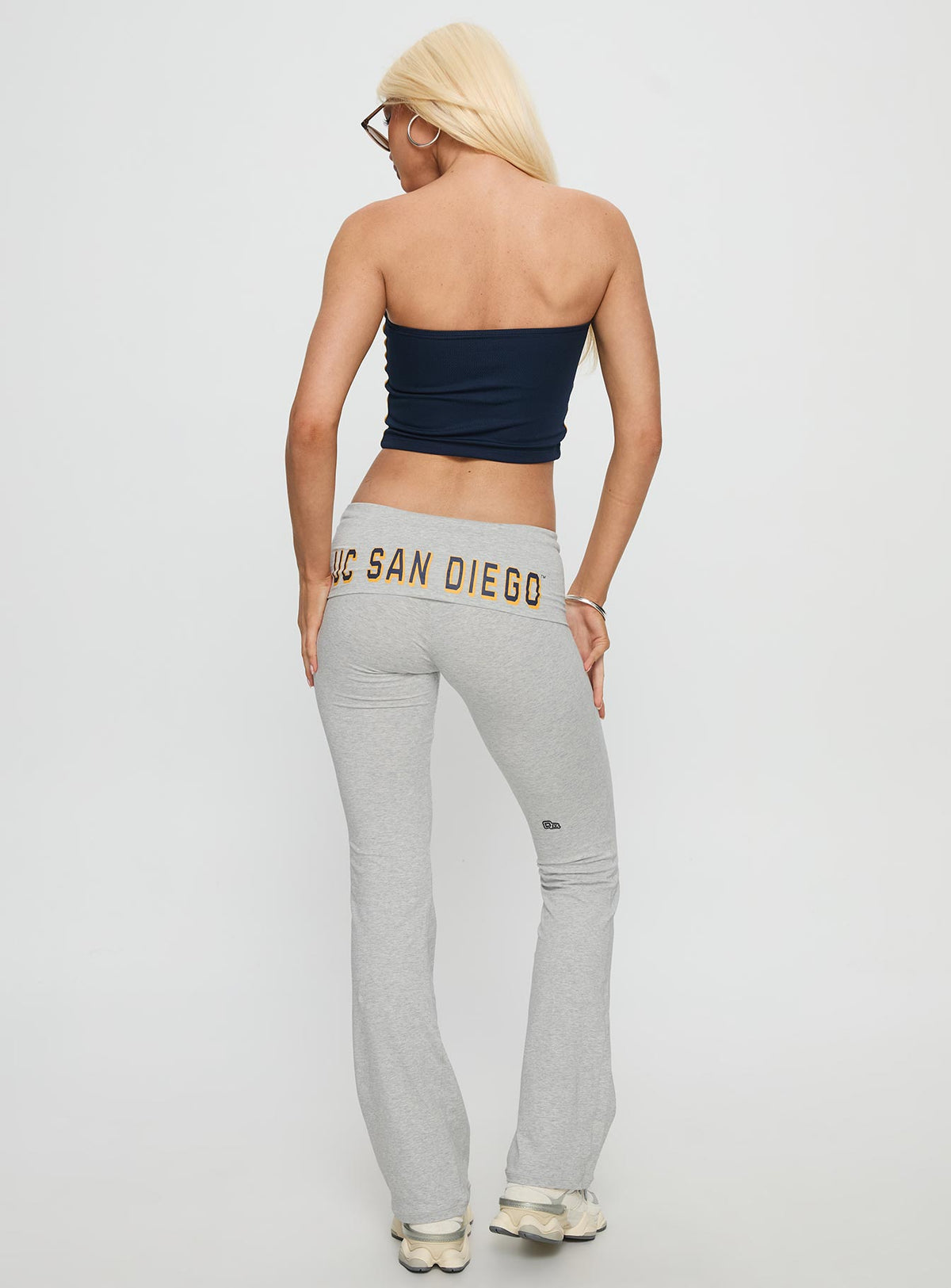 back view of model wearing Princess Polly UC San Diego Foldover Pant Heather Grey Mid Rise Pants 