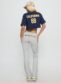 back view of model wearing Princess Polly UC Berkeley Foldover Pants Grey Mid Rise Pants 