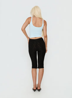 back view of model wearing Princess Polly Samaira Capri Pant Black Anglaise Mid Rise Pants 