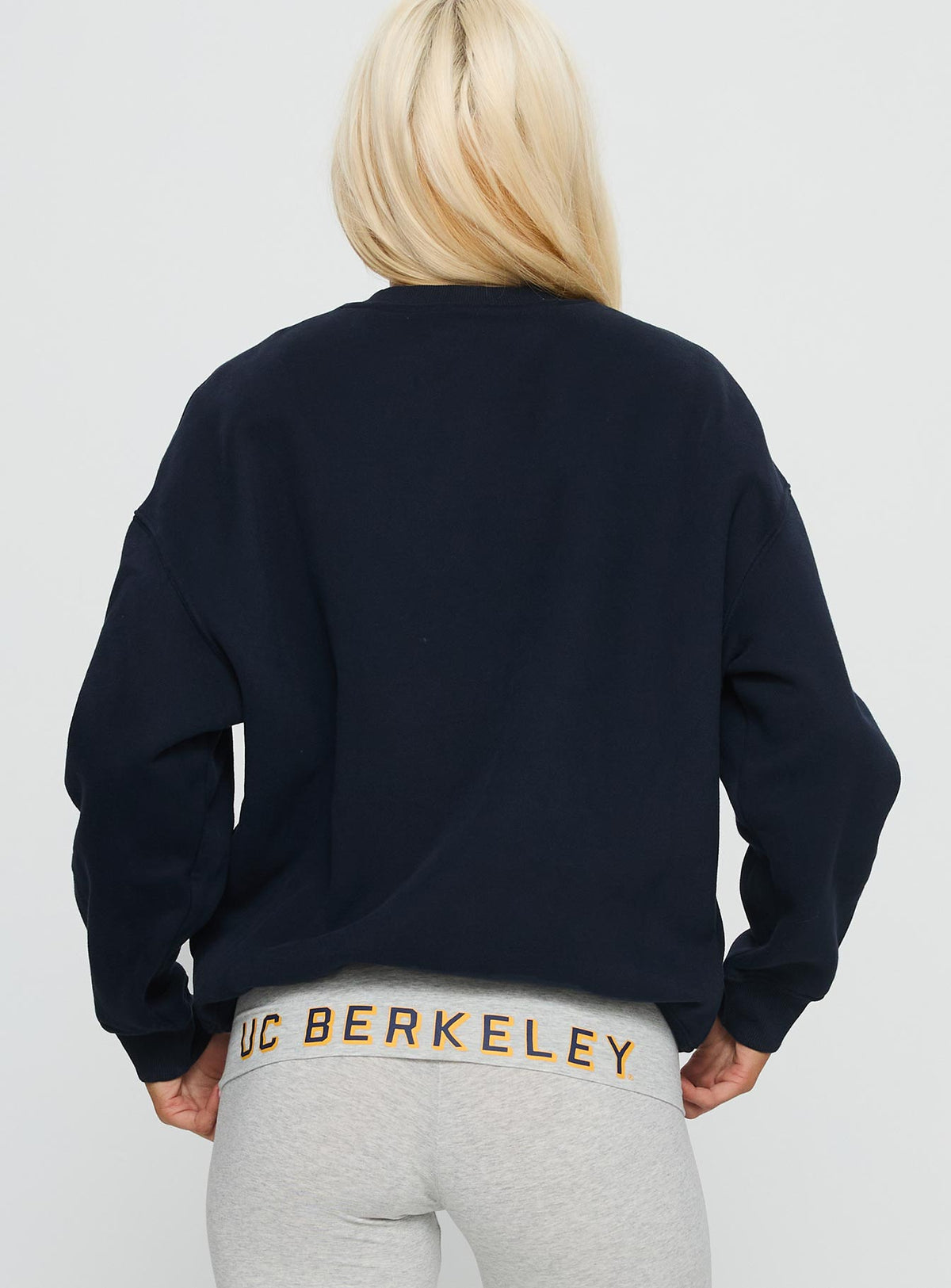 back view of model wearing Princess Polly UC Berkeley Offside Crewneck Sweatshirt Navy 