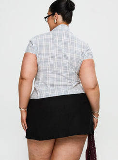back view of model wearing Princess Polly Can't Sleep Skort Black Curve Low Rise Shorts 