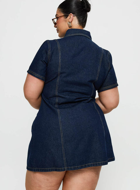 back view of model wearing Princess Polly Perception Denim Mini Dress Mid Wash Curve V-Neck 