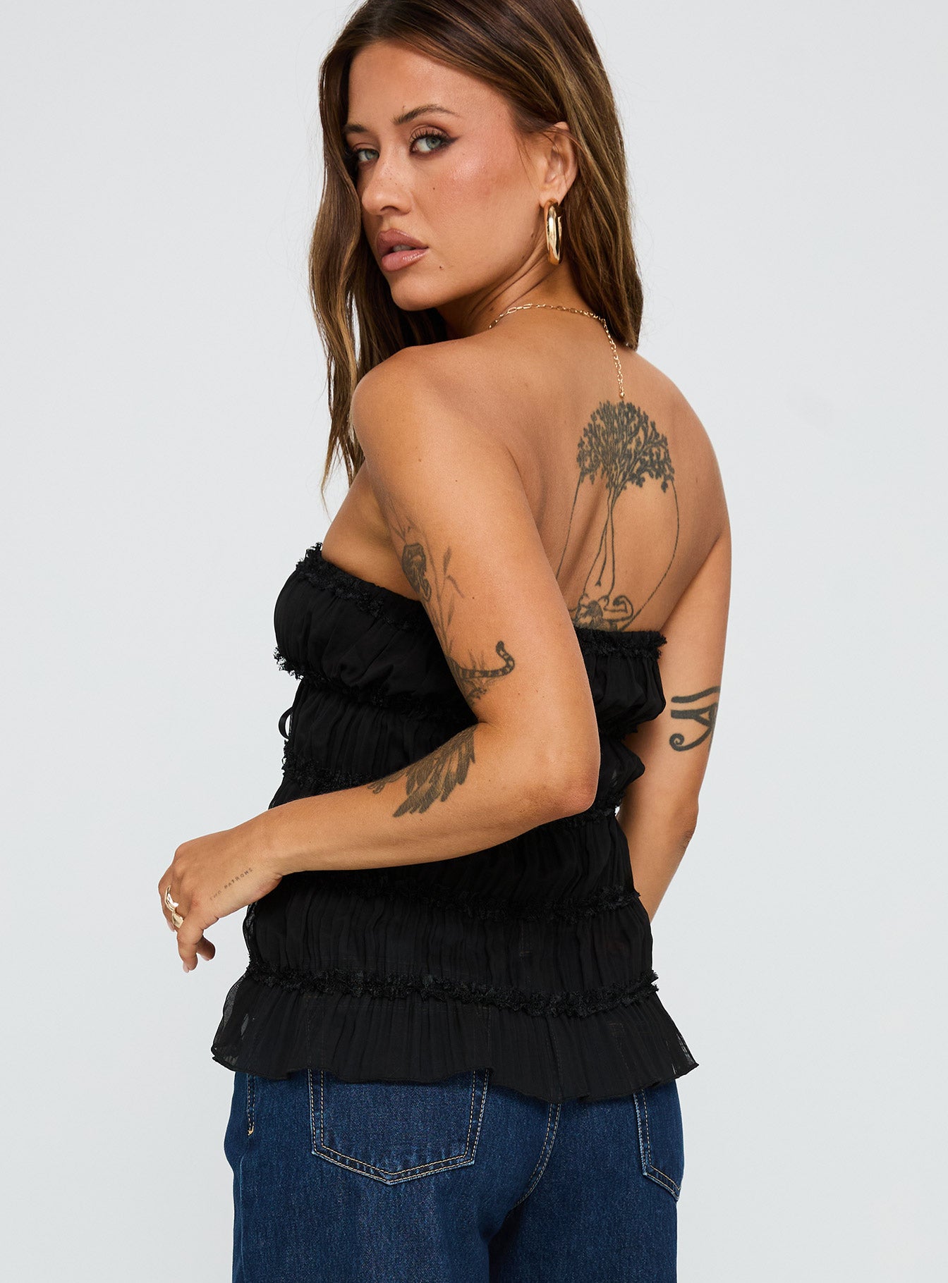 back view of model wearing Princess Polly Avelina Strapless Top Black Sleeveless straight 