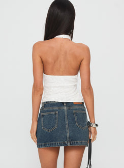 back view of model wearing Princess Polly Nickei Denim Mini Skirt Washed Blue Petite Mini Skirts 