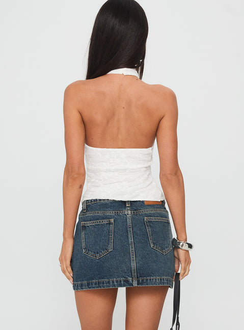 back view of model wearing Princess Polly Nickei Denim Mini Skirt Washed Blue Petite Mini Skirts 