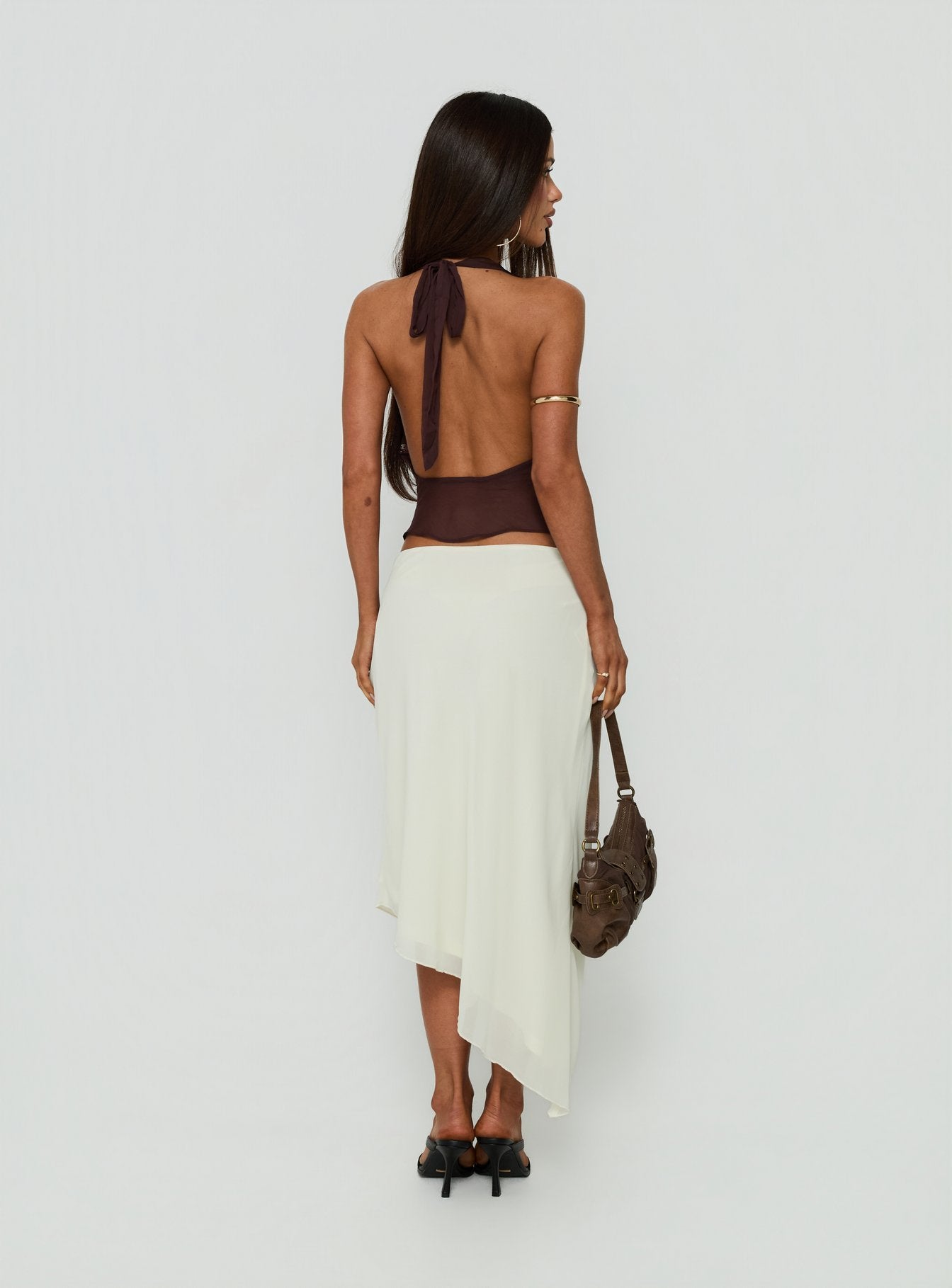 Presenting the Suella Asymmetrical Midi Skirt Off White in womens-skirts with a midi length back view of model wearing Princess Polly