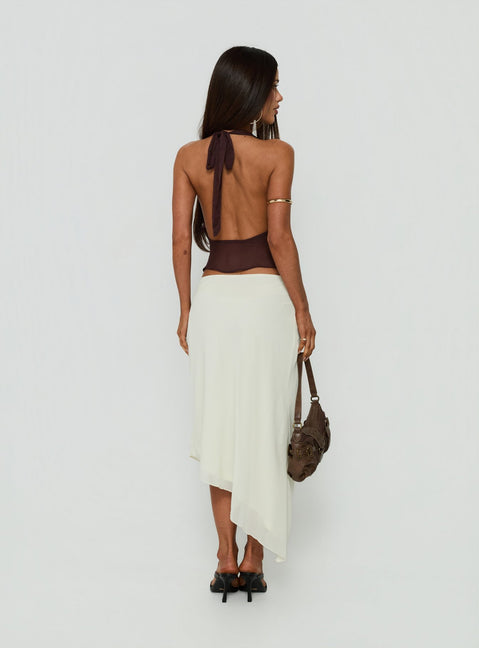 Presenting the Suella Asymmetrical Midi Skirt Off White in womens-skirts with a midi length back view of model wearing Princess Polly