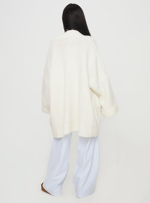 back view of model wearing Princess Polly Paisleigh Cable Knit Cardigan Cream Longline Jumpers Jumpers 