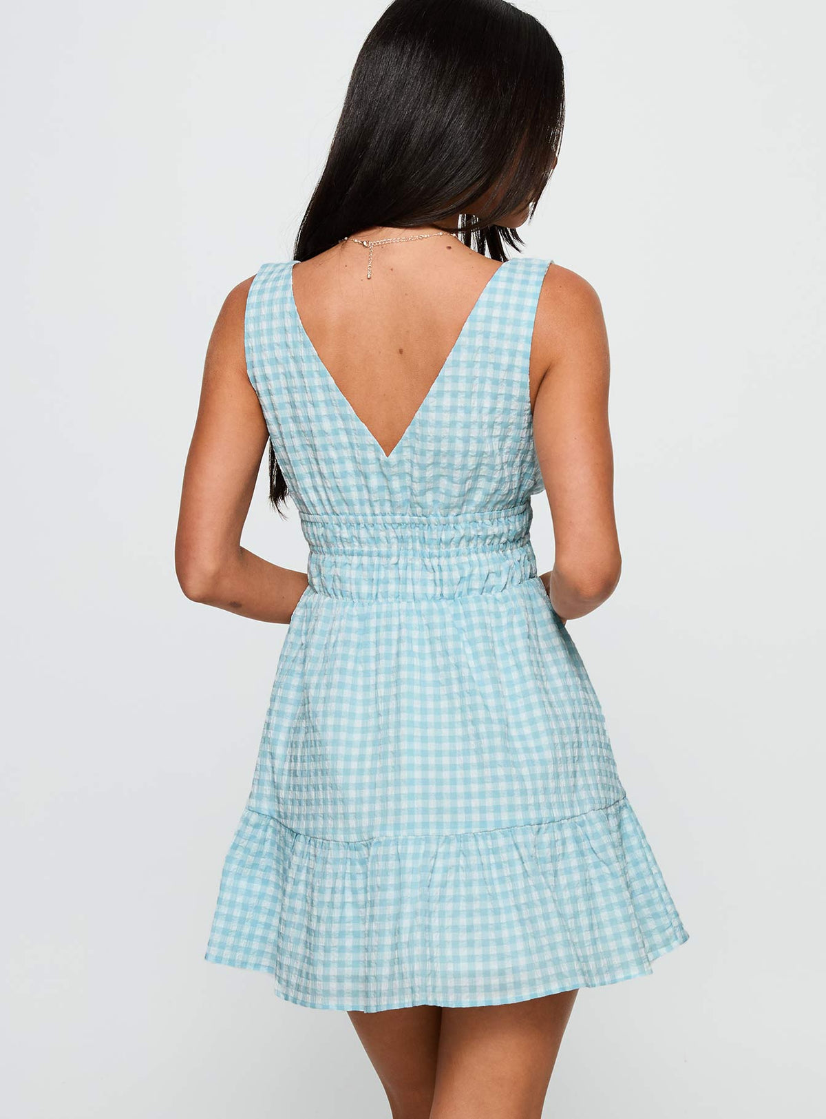 back view of model wearing Princess Polly Ismena Plunge Mini Dress Blue Check Plunger 