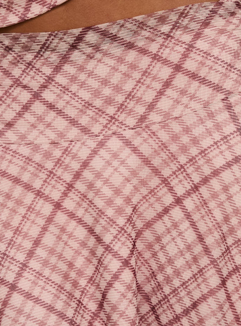 Explore the Waverlee Asymmetrical Midi Skirt Pink Check womens-skirts featuring fitted cut, checkered pattern, and ruched elements Princess Polly