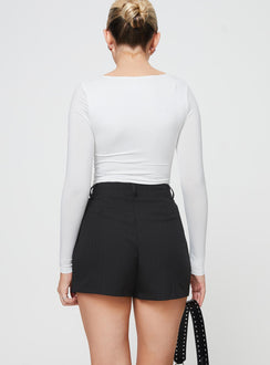 back view of model wearing Princess Polly Seize The Day Shorts Black High Waisted Shorts 