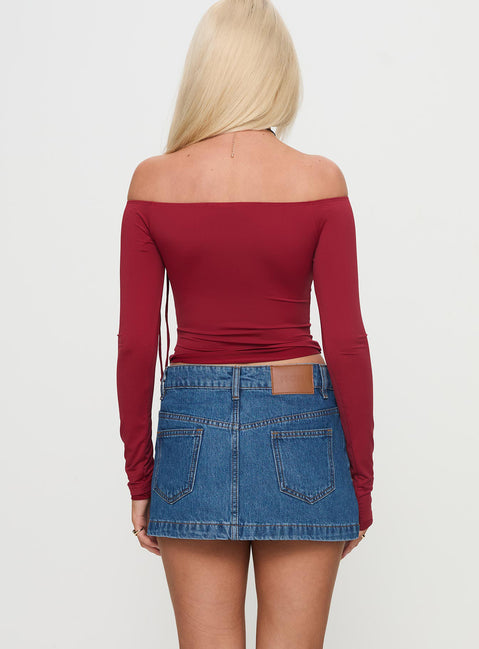 back view of model wearing Princess Polly Nicolina Low Rise Denim Mini Skirt Light Wash Tall Mini Skirts 