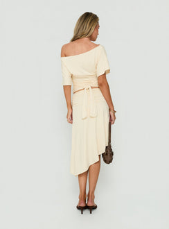 Explore the Sezzia Ruched Asymmetrical Midi Skirt Beige womens-skirts in fitted length back view of model wearing Princess Polly