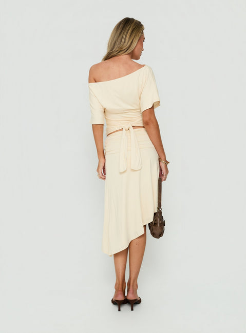Explore the Sezzia Ruched Asymmetrical Midi Skirt Beige womens-skirts in fitted length back view of model wearing Princess Polly
