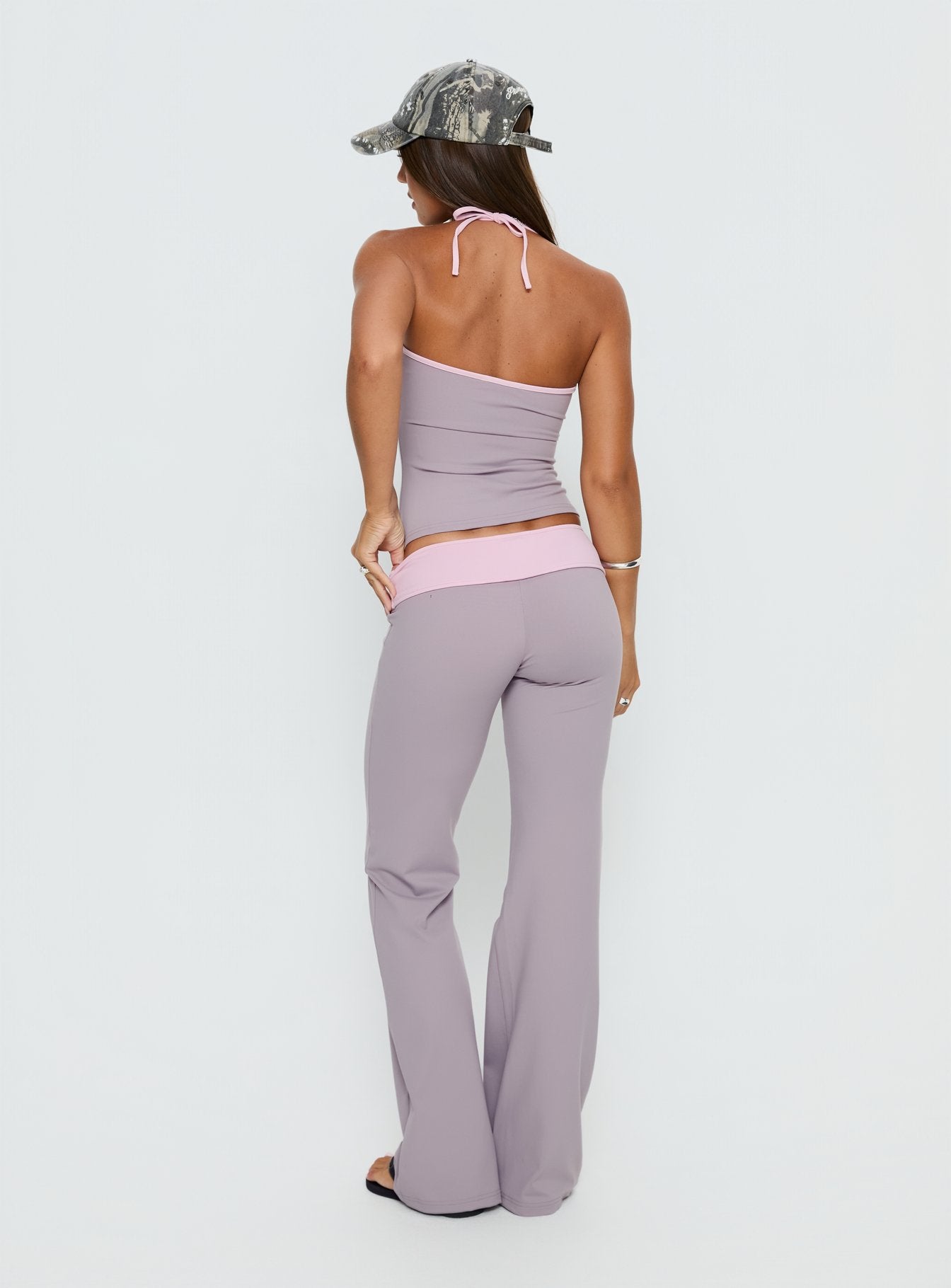 back view of model wearing Princess Polly Kobee Jersey Flare Pants Slate / Dusty Pink Mid Rise Pants 