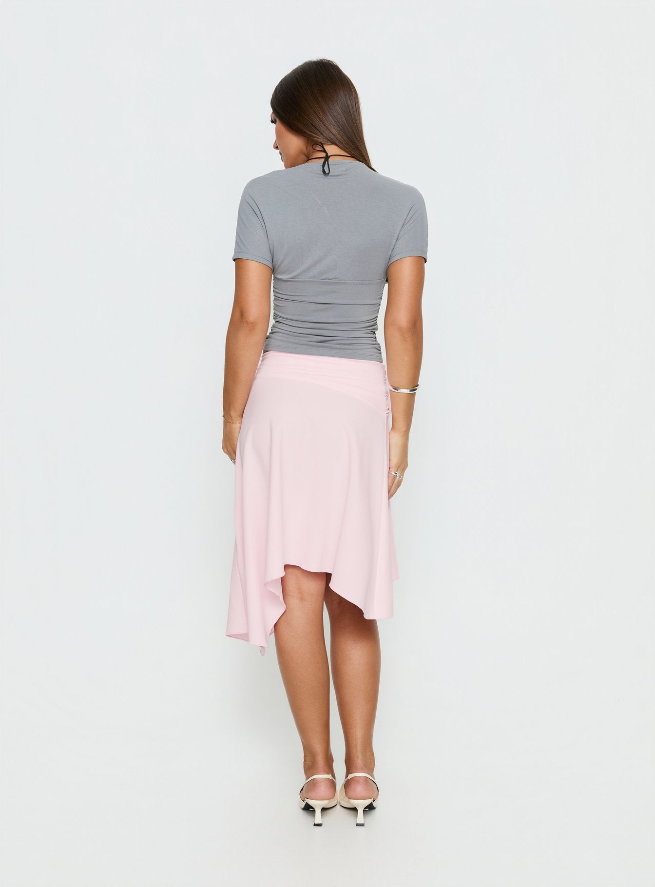 back view of model wearing Princess Polly Ismora Asymmetrical Midi Skirt Pink 