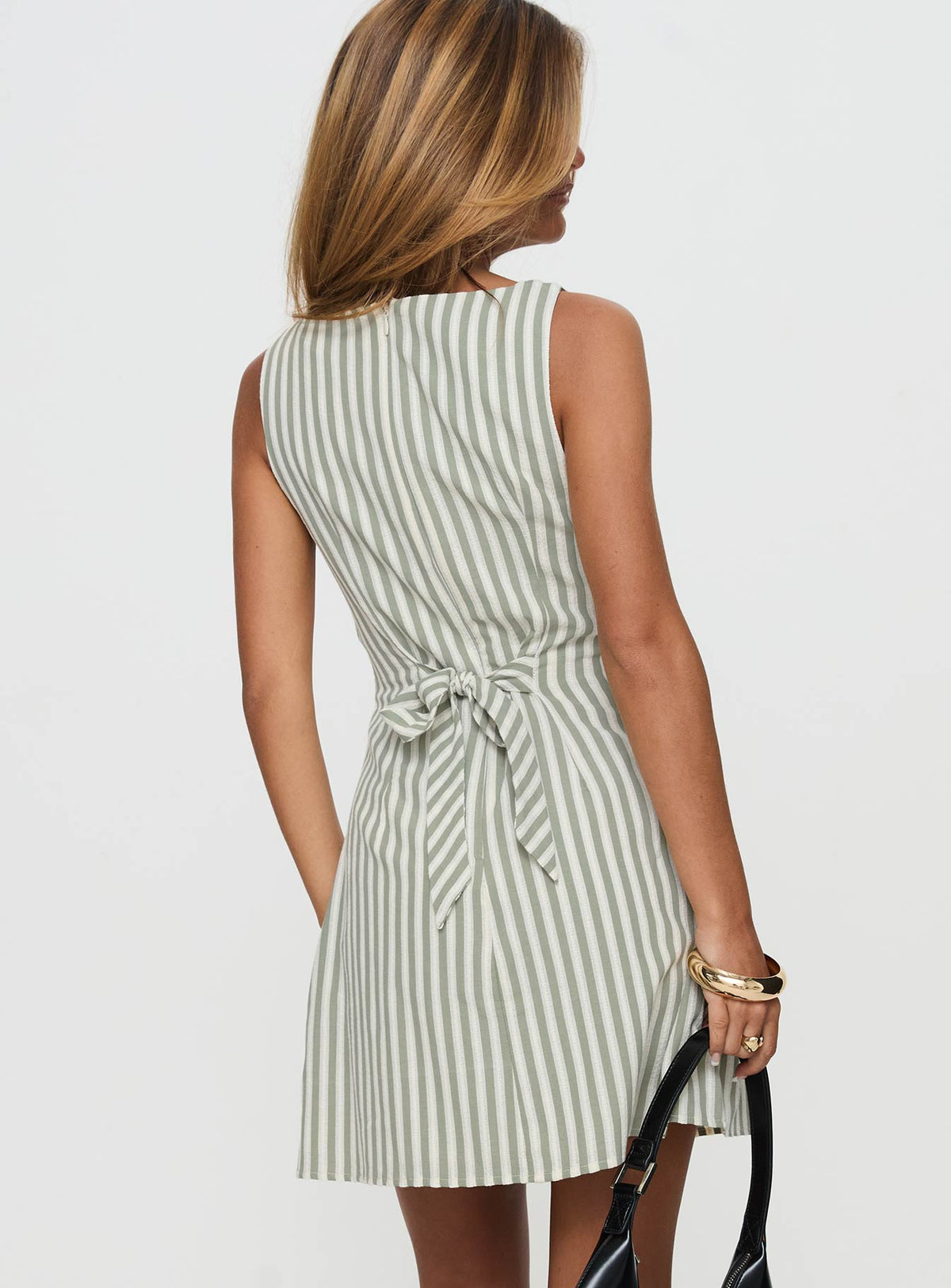 back view of model wearing Princess Polly Alfalfa Shift Mini Dress Green Stripe Boat Neck 