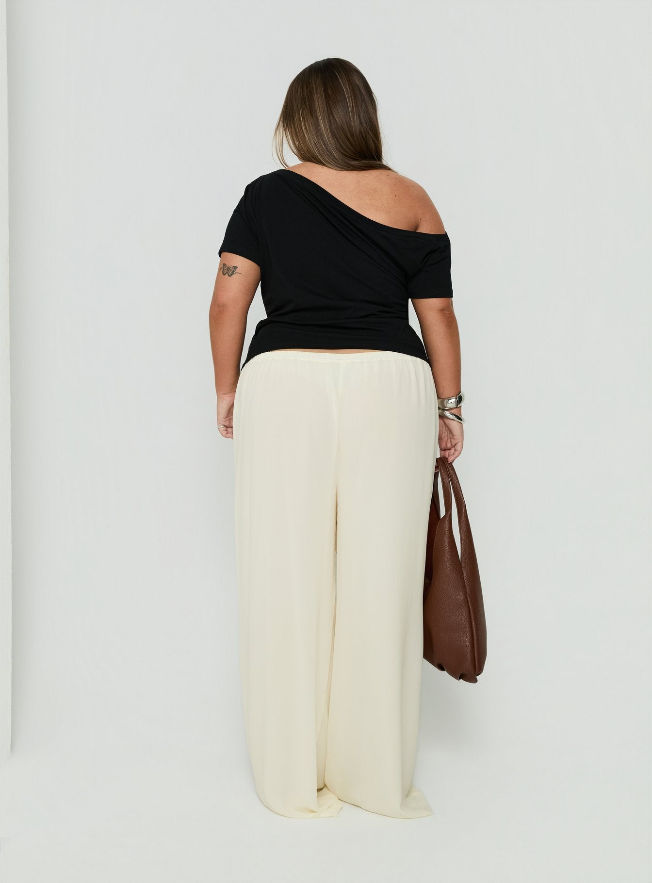 Presenting Finesse Pants Yellow Curve womens-regular-pants with mid-rise back view of model wearing