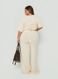 Displaying Calisse Knit Wide Leg Pants Beige Curve womens-regular-pants with high-rise back view of model wearing