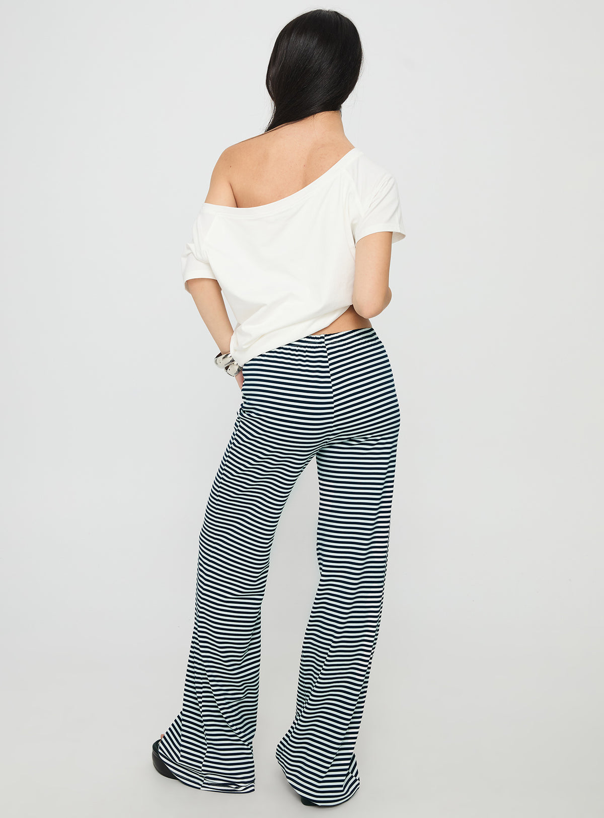 back view of model wearing Princess Polly Alfreda Jersey Pant Navy Stripe High Waisted Pants 