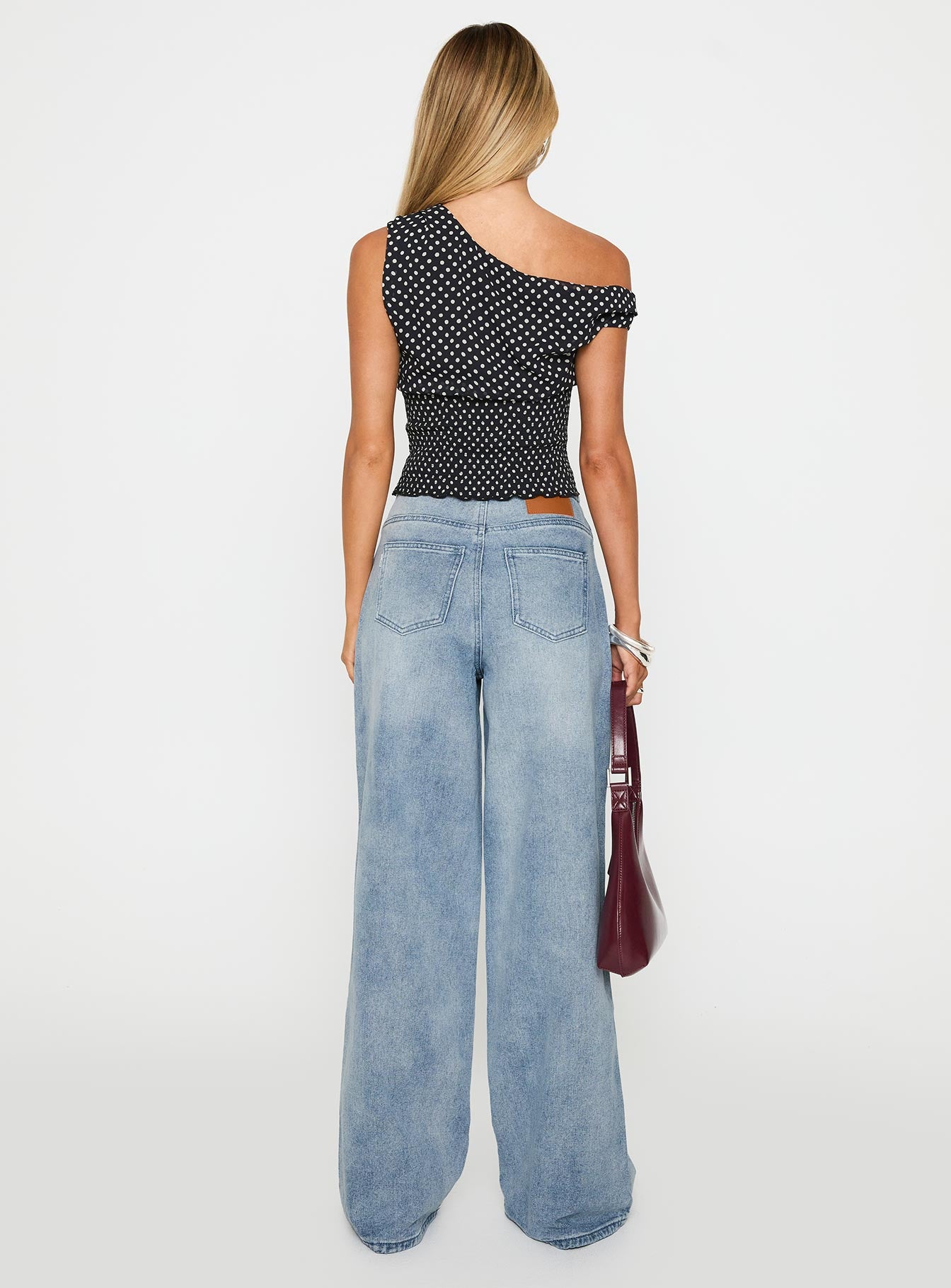 back view of model wearing Princess Polly Bowe Wide Leg Jeans Blue High Waisted 