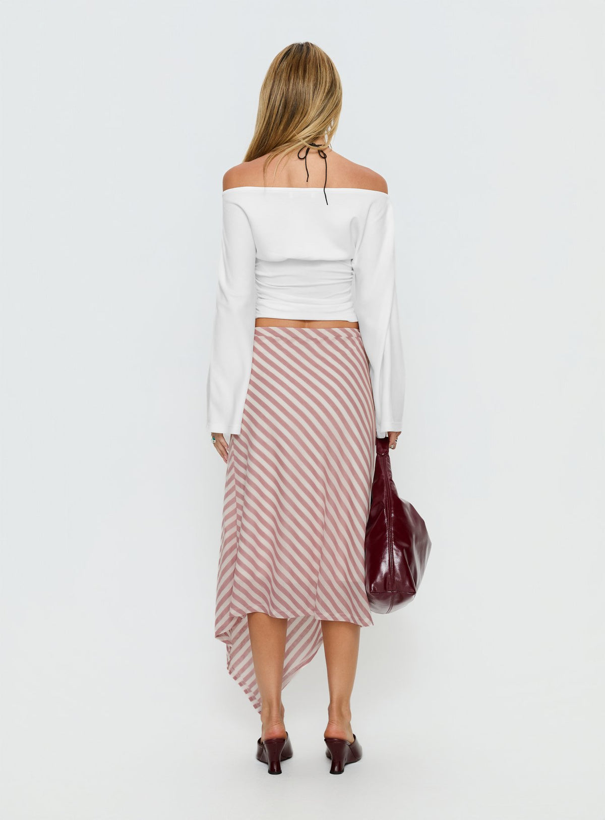 back view of model wearing Princess Polly Gwenora Asymmetrical Midi Skirt Pink Stripe Midi Skirts 