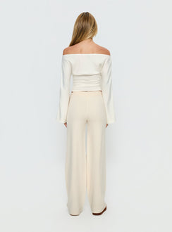 back view of model wearing Princess Polly Felisha Low Waist Knit Pants White Mid Rise Pants 