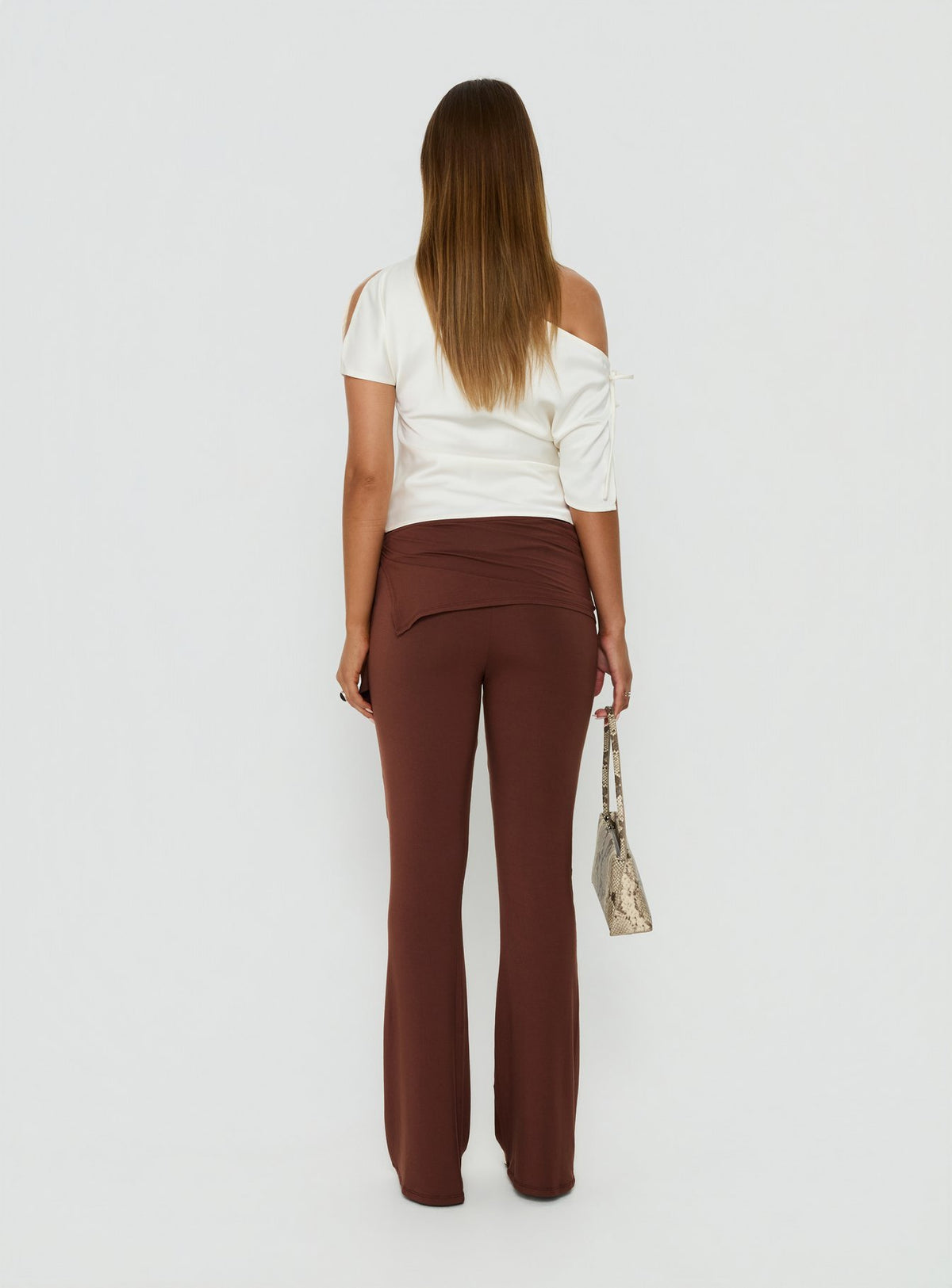 Designed with high-rise waist the Masimo Layered Pants Chocolate womens regular pants in wide-leg silhouette back view of model wearing Princess Polly