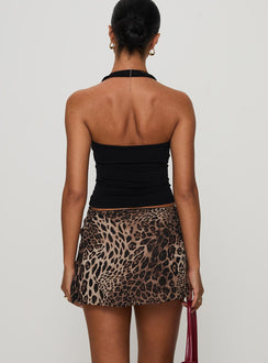 back view of model wearing Princess Polly Tejano Mini Skirt Leopard Petite Mini Skirts 