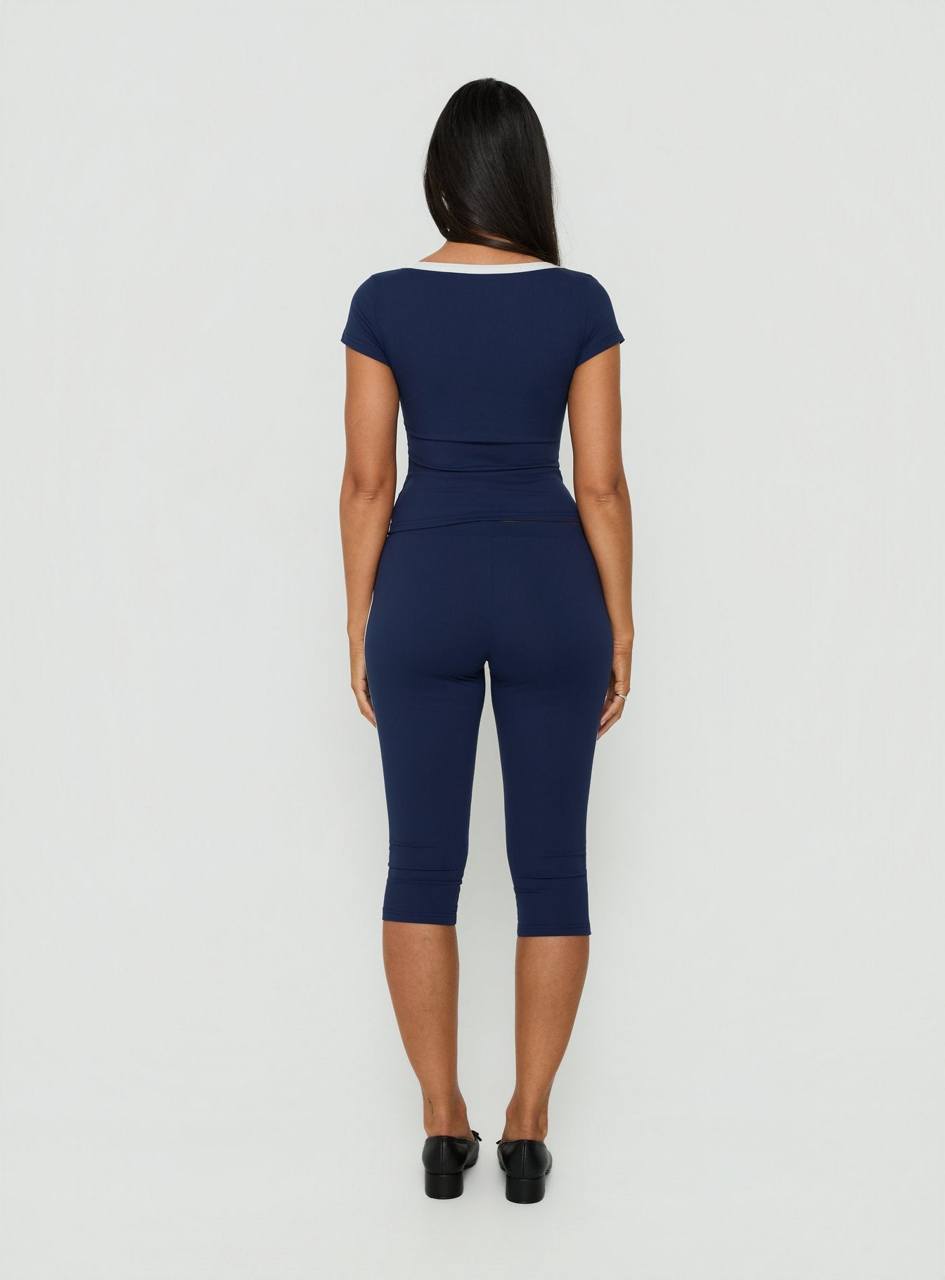 View the Rowanna Sporty Capri Pants Navy / Cream womens-regular-pants in high-rise back view of model wearing